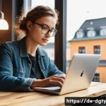 Home 22 디지털 노마드가 선호하는 직종과 산업 - A focused digital nomad woman working on her sleek laptop at a cozy café in Berlin, wearing stylish ...