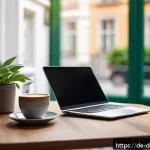 Home 23 재택근무로 전환하는 디지털 노마드 전략 - A modern digital nomad workspace set up in a cozy European café with warm natural daylight streaming...